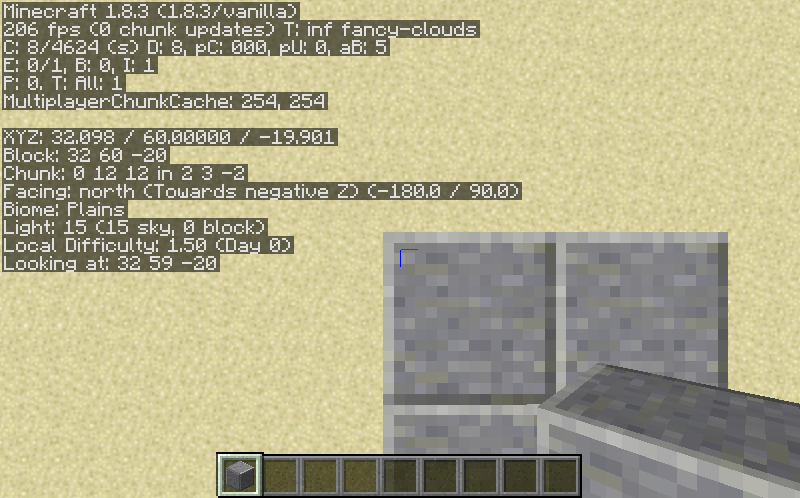 The player in this screenshot is standing at the top edge of the polished andesite tower. The coordinates are visible in the corner.
